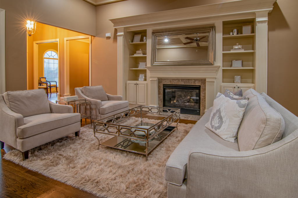 The Art of Drawing Readers In: Your attractive post title goes here Luxurious living room featuring modern furniture and a cozy fireplace for a warm ambiance.
