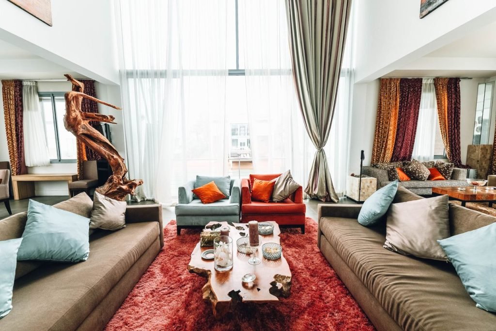 Crafting Captivating Headlines: Your awesome post title goes here A spacious, luxurious living room with modern furnishings and natural wood decor.